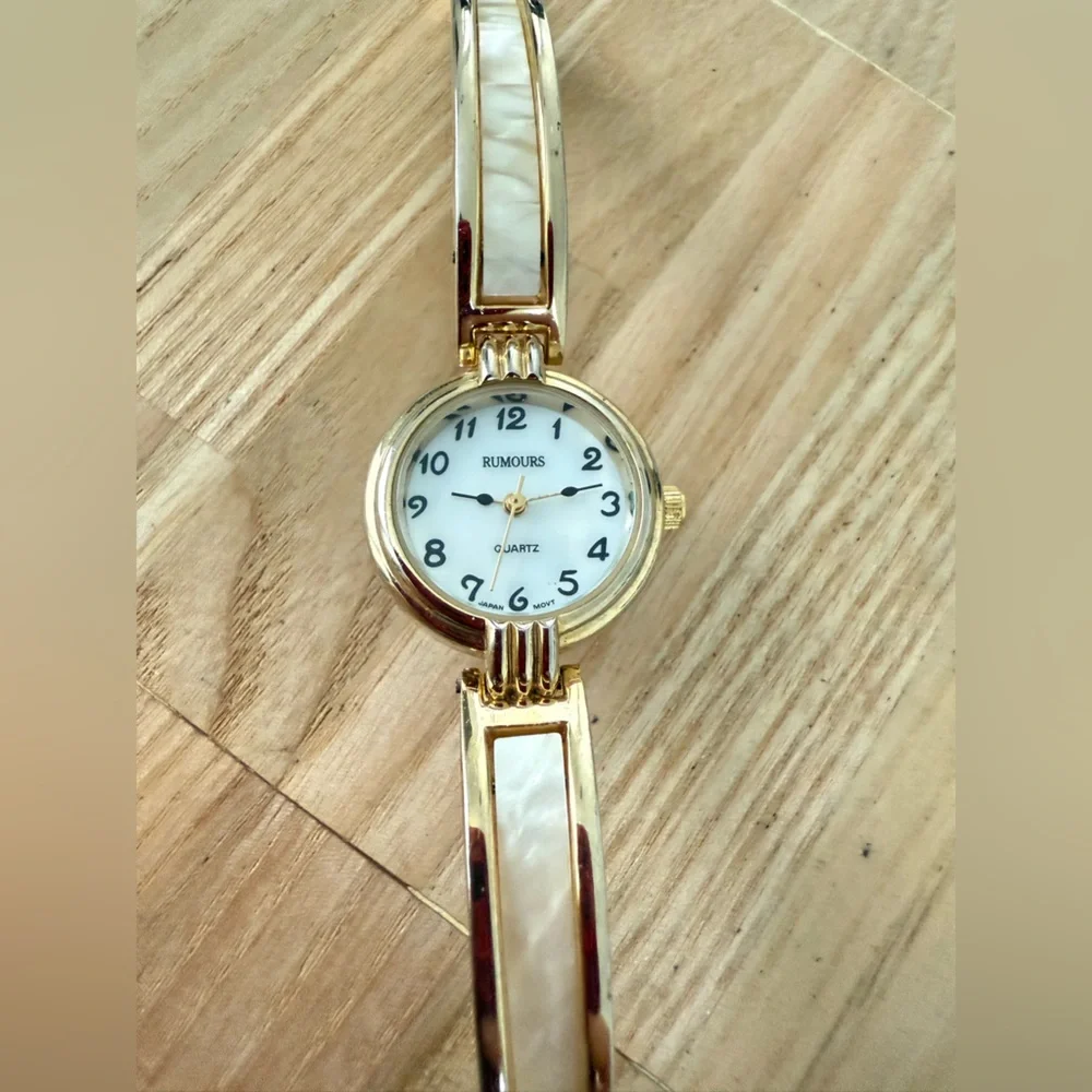 Rumours ladies gold tone watch NEW BATTERY